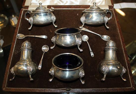 Walker & Hall cased 6 piece silver cruet set and a silver sugar sifting spoon